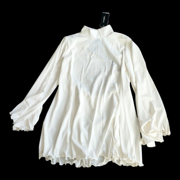 Uoozee Tops - Elegant White High-Neck Blouse – Open Back, Romantic Ruffle Hem, Bishop Sleeve